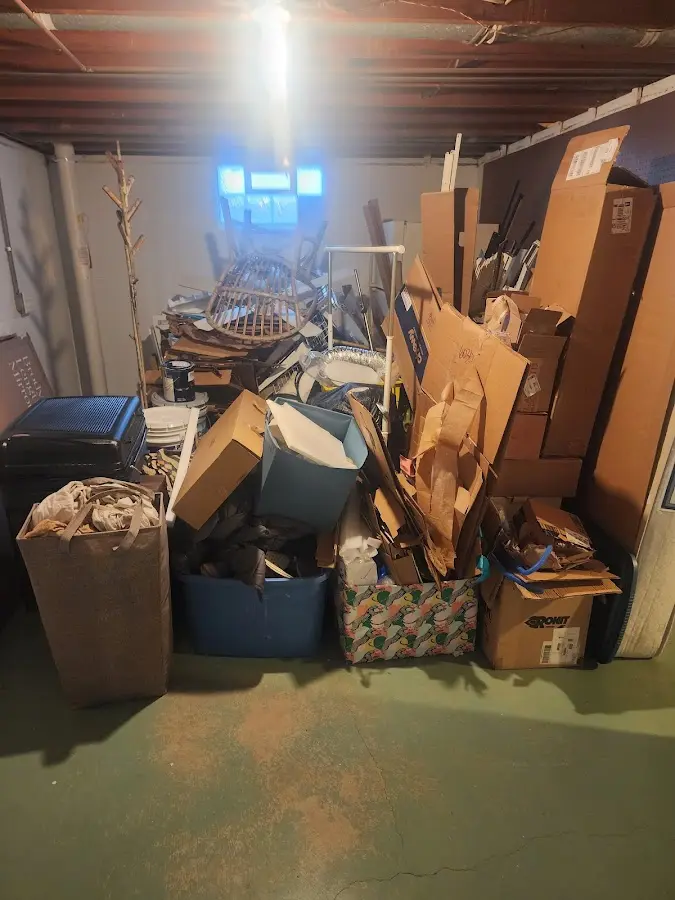 Roll-off dumpster container at job site for 2 Yard Dumpster Rental in Inverness Highlands South